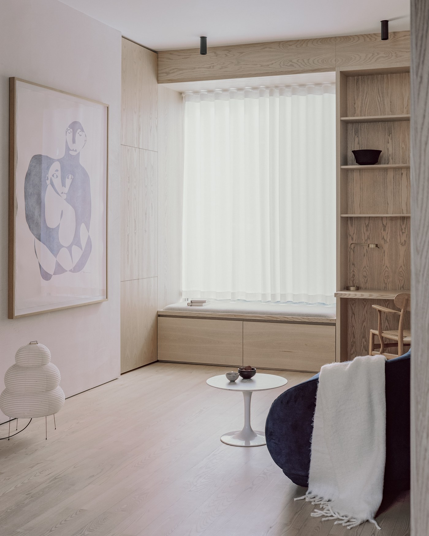 Caithness Road W14 — ash window seat with drawers below, set between full-height ash shelving and cupboards