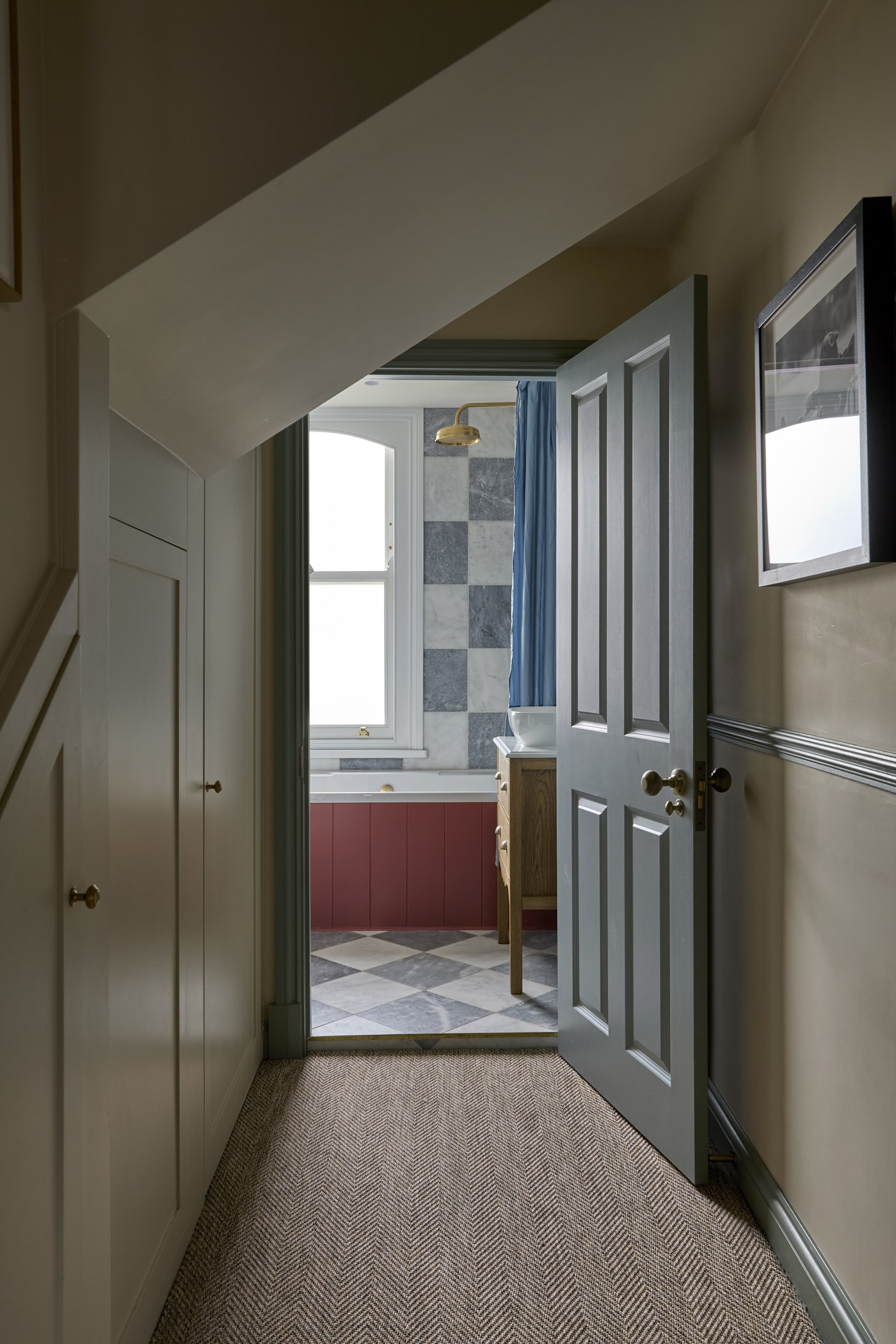 Landing at Melrose Gardens with a chequerboard floor, looking through to the bathroom
