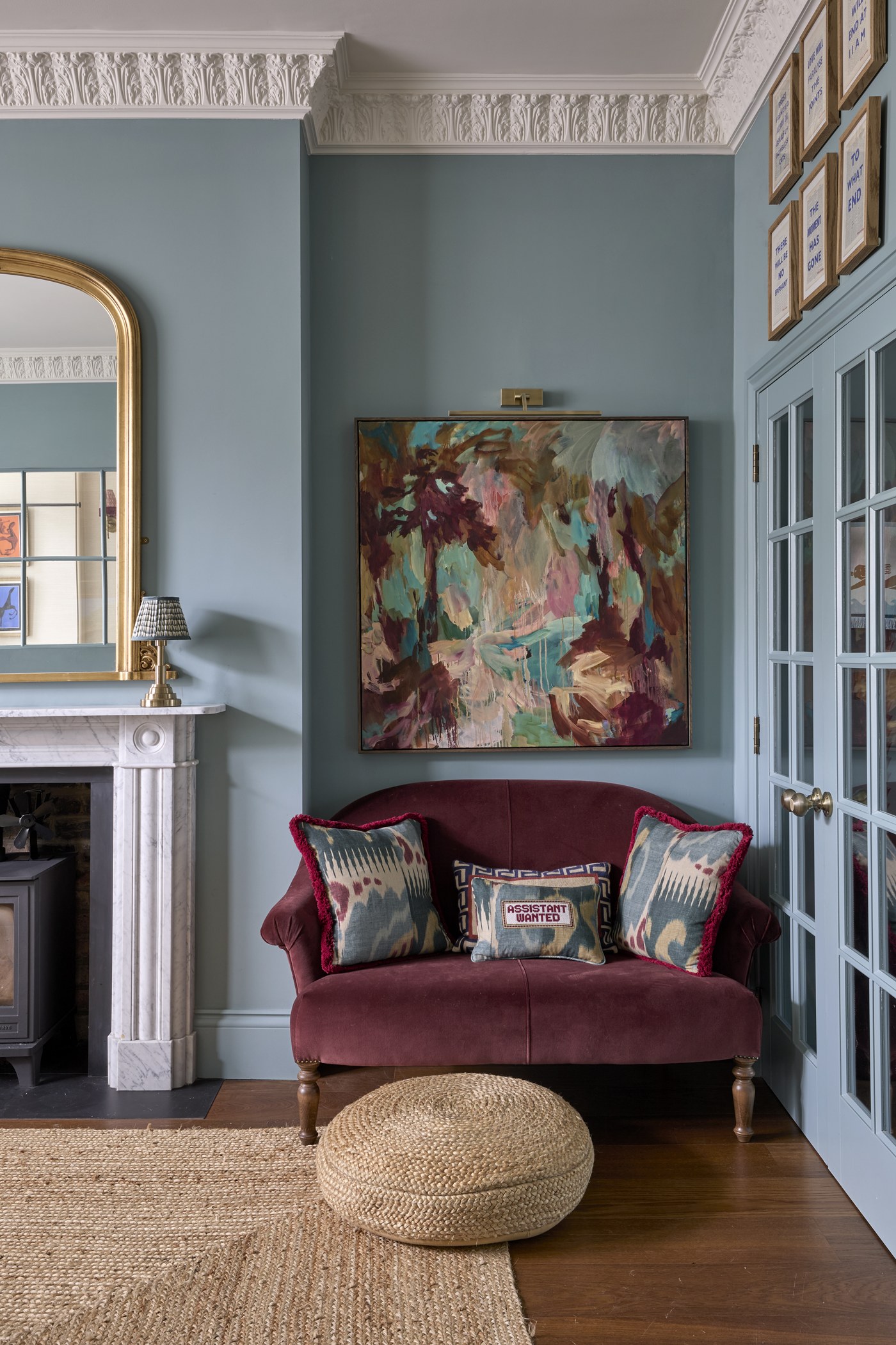 Reception room at Melrose Gardens after refurbishment, with double doors through to the hall